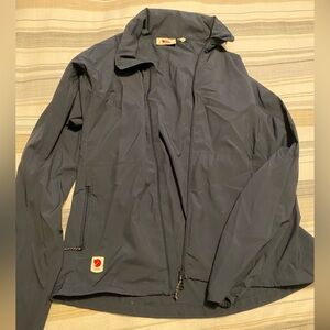 Like new Fjallraven Jacket with Fold away Hood